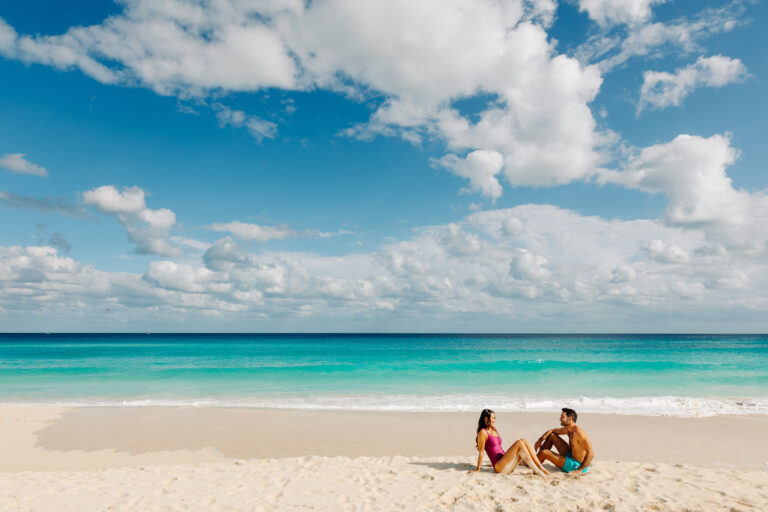 Couple sitting together on a beach